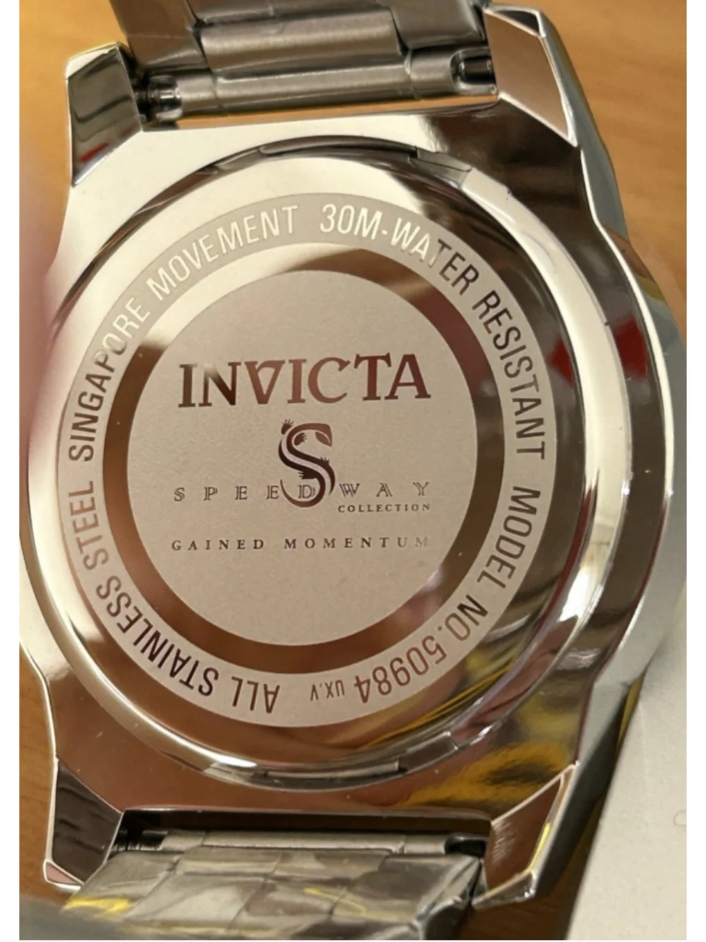Invicta Model 50984 Silver Band w/ Blue Face Singapore Movement 30M Water Resist